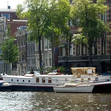 Warm Art Deco Houseboat Amstel River * Амстердам